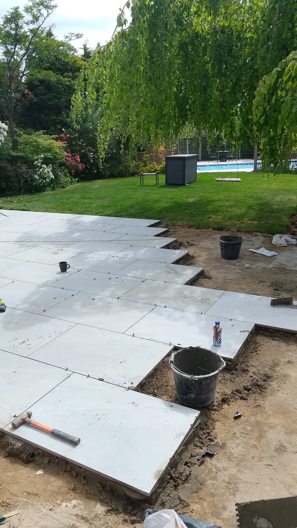 Laid to a line — Full mortar bed, backs primed
