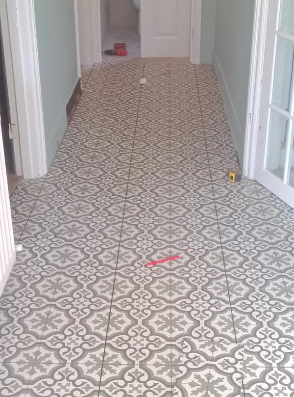 Patterned corridor — Continuous run through to the kitchen