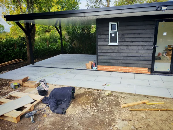 Terrace to garden room — Levels matched across the threshold